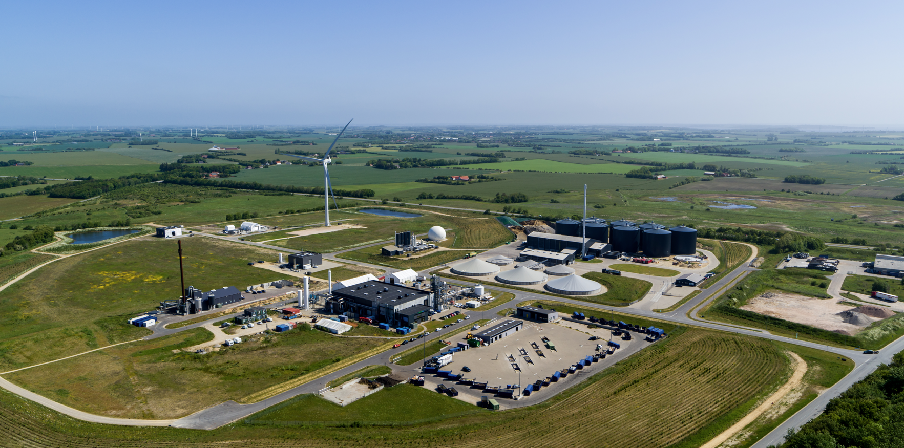 Aerial view of GreenLab energy and technology park surrounded by green countryside.