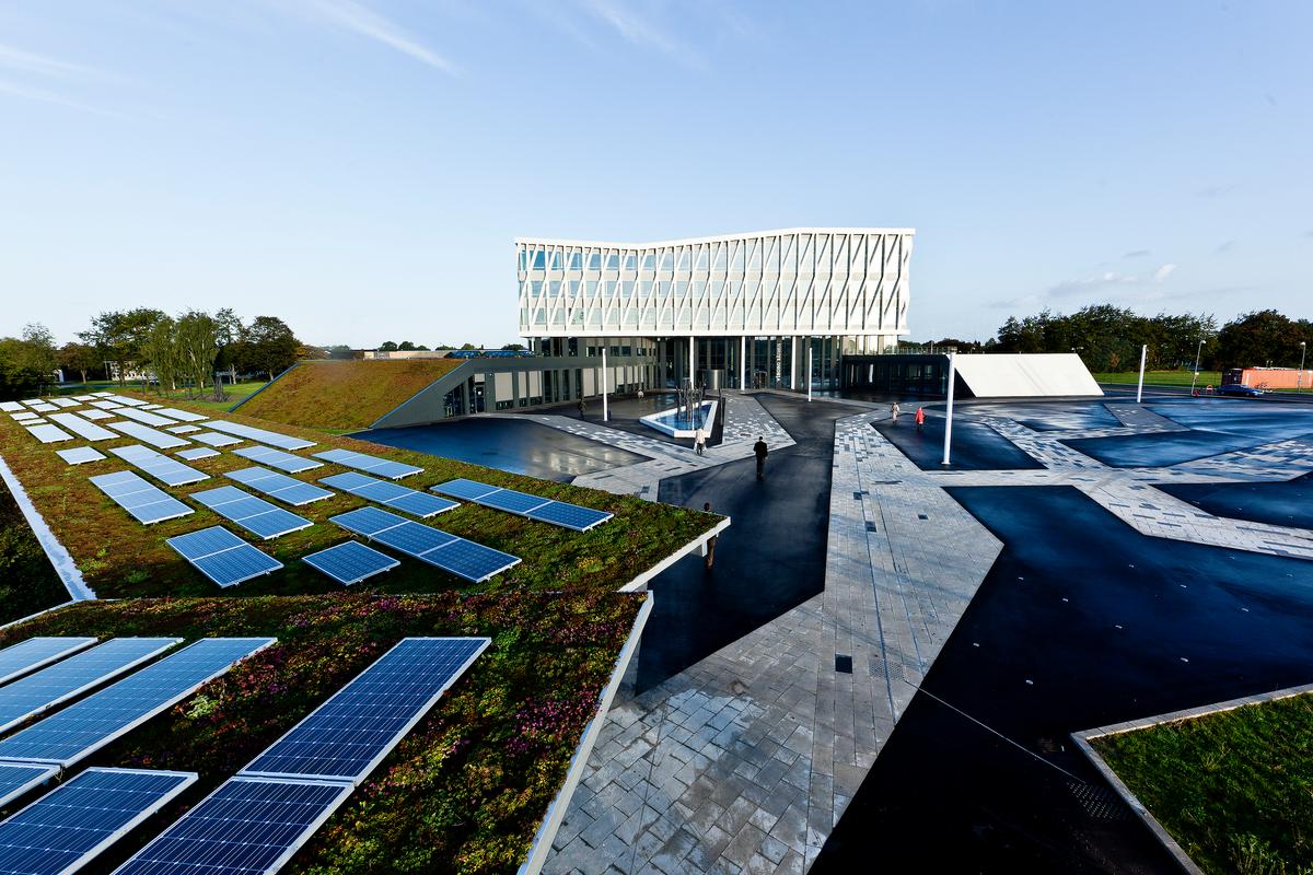 Modern energy-efficient building with solar panels and green roof in Viborg, Denmark